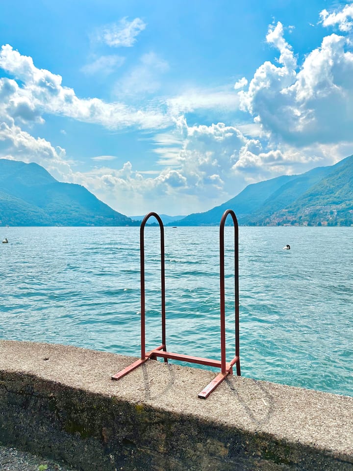 Swimming spot with water stairs into Lake Como